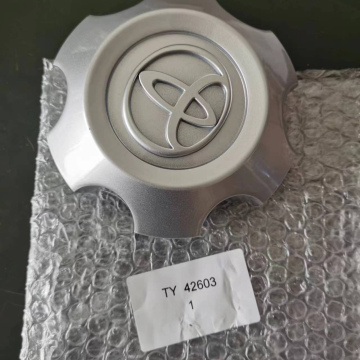L021.8b	Vehicular Tapa-Rim Eje de Llanta Toyota 13cm (Pentagonal) mm Hilux/Prado/Hiace 4X4 B TY4603